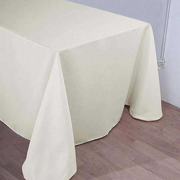 Polyester |  90″x156″ Ivory Seamless Polyester Rectangular Tablecloth for 8 Foot Table With Floor-Length Drop