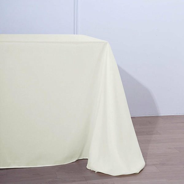 Polyester |  90″x156″ Ivory Seamless Polyester Rectangular Tablecloth for 8 Foot Table With Floor-Length Drop