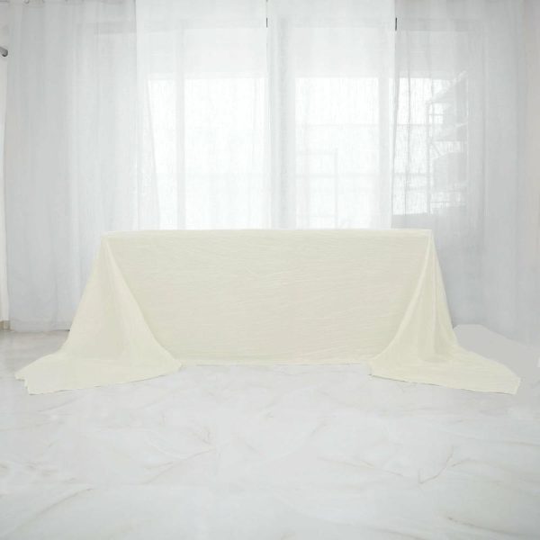 Taffeta & Velvet |  90″x156″ Ivory Accordion Crinkle Taffeta Seamless Rectangular Tablecloth for 8 Foot Table With Floor-Length Drop